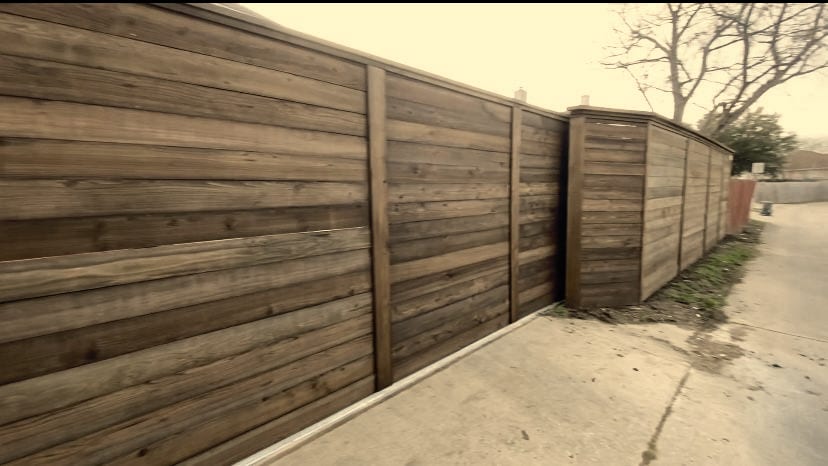Horizontal pre-stain cedar fencing built by A+ Fence Company